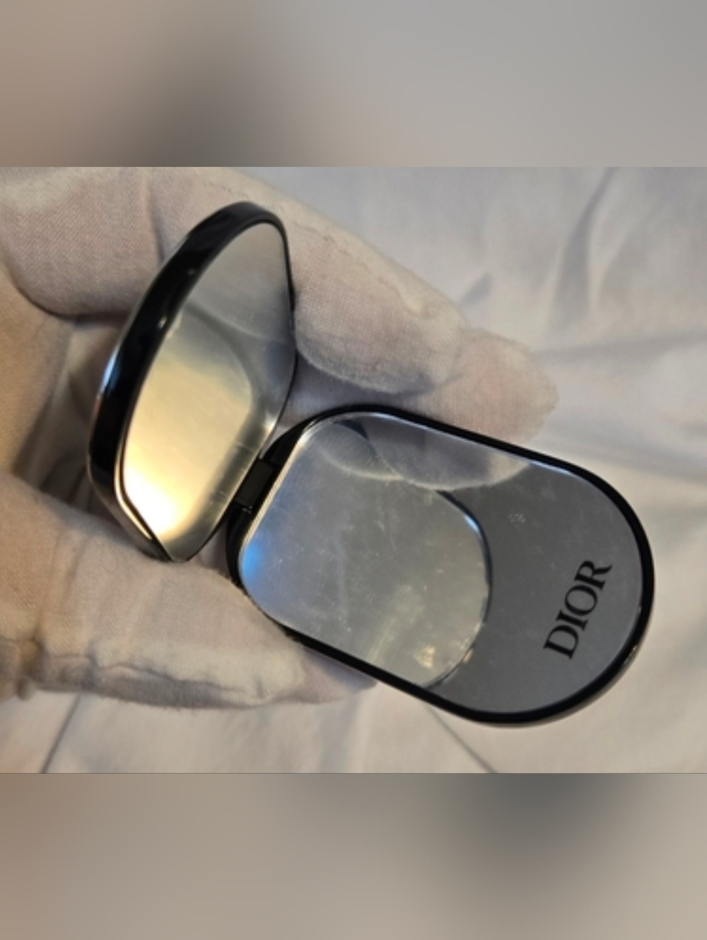 Black and Silver Compact Mirror Attachable To Phone
